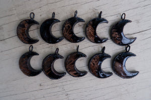 Fossilized Palm Root Crescent Moon Pendant